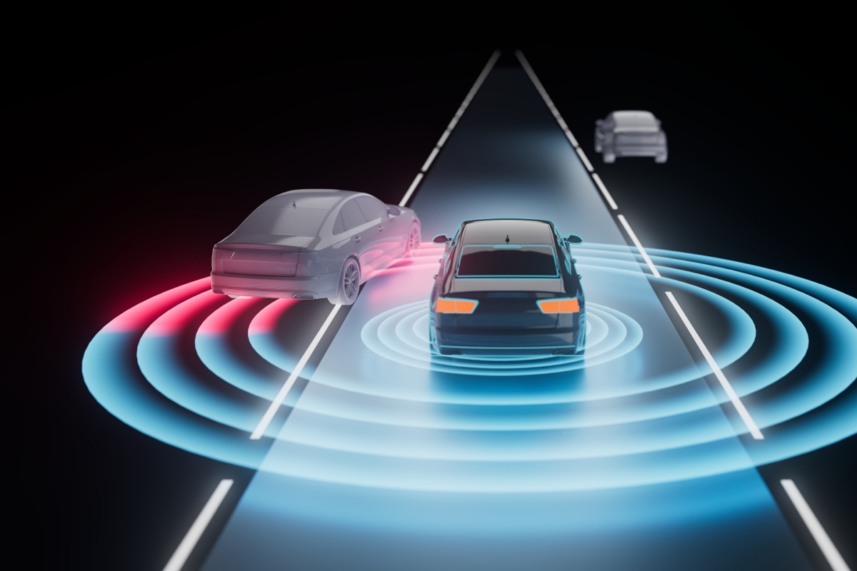 Illustration of a car on a night road, its sensor fields drawn as blue rings around it and red where a car in the next lane is close.